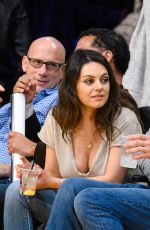 Pregnant MILA KUNIS and Ashton Kutcher at LA Lakers Game in Los Angeles