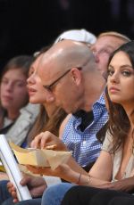 Pregnant MILA KUNIS and Ashton Kutcher at LA Lakers Game in Los Angeles