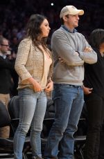 Pregnant MILA KUNIS and Ashton Kutcher at LA Lakers Game in Los Angeles