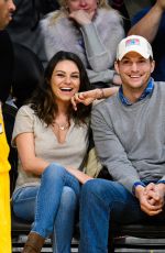 Pregnant MILA KUNIS and Ashton Kutcher at LA Lakers Game in Los Angeles