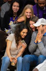 Pregnant MILA KUNIS and Ashton Kutcher at LA Lakers Game in Los Angeles