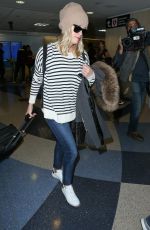 REESE WITHERSPOON Arrives at Los Angeles International Airport 0412