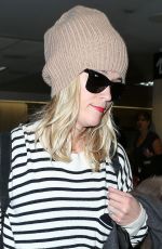 REESE WITHERSPOON Arrives at Los Angeles International Airport 0412