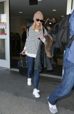 REESE WITHERSPOON Arrives at Los Angeles International Airport 0412