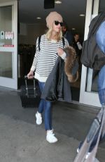 REESE WITHERSPOON Arrives at Los Angeles International Airport 0412