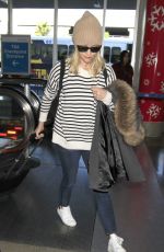 REESE WITHERSPOON Arrives at Los Angeles International Airport 0412