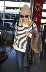REESE WITHERSPOON Arrives at Los Angeles International Airport 0412