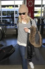 REESE WITHERSPOON Arrives at Los Angeles International Airport 0412