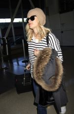 REESE WITHERSPOON Arrives at Los Angeles International Airport 0412