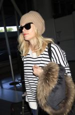 REESE WITHERSPOON Arrives at Los Angeles International Airport 0412