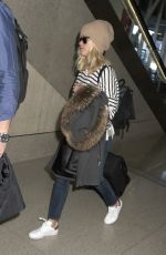 REESE WITHERSPOON Arrives at Los Angeles International Airport 0412