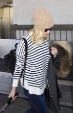 REESE WITHERSPOON Arrives at Los Angeles International Airport 0412