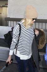 REESE WITHERSPOON Arrives at Los Angeles International Airport 0412