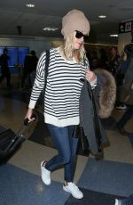 REESE WITHERSPOON Arrives at Los Angeles International Airport 0412