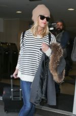 REESE WITHERSPOON Arrives at Los Angeles International Airport 0412