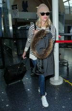 REESE WITHERSPOON Arrives at Los Angeles International Airport 0412