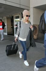 REESE WITHERSPOON Arrives at Los Angeles International Airport 0412
