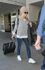 REESE WITHERSPOON Arrives at Los Angeles International Airport 0412