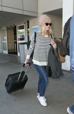 REESE WITHERSPOON Arrives at Los Angeles International Airport 0412