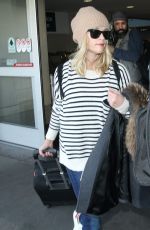 REESE WITHERSPOON Arrives at Los Angeles International Airport 0412