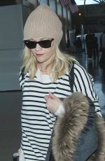 REESE WITHERSPOON Arrives at Los Angeles International Airport 0412