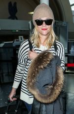 REESE WITHERSPOON Arrives at Los Angeles International Airport 0412