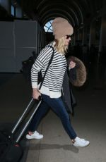 REESE WITHERSPOON Arrives at Los Angeles International Airport 0412