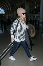 REESE WITHERSPOON Arrives at Los Angeles International Airport 0412