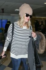REESE WITHERSPOON Arrives at Los Angeles International Airport 0412