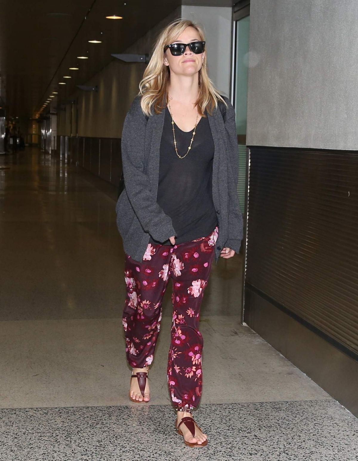 REESE WITHERSPOON Arrives at Miami International Airport 2012 REESE WITHERSPOON Arrives at Miami International Airport 2012