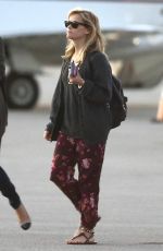 REESE WITHERSPOON Arrives at Miami International Airport 2012