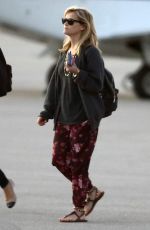 REESE WITHERSPOON Arrives at Miami International Airport 2012