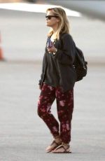 REESE WITHERSPOON Arrives at Miami International Airport 2012