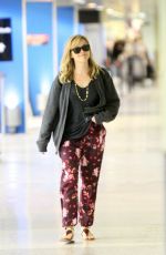 REESE WITHERSPOON Arrives at Miami International Airport 2012