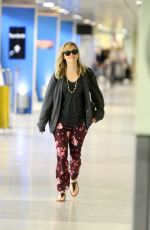 REESE WITHERSPOON Arrives at Miami International Airport 2012