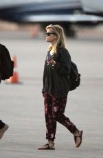 REESE WITHERSPOON Arrives at Miami International Airport 2012