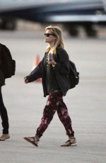REESE WITHERSPOON Arrives at Miami International Airport 2012