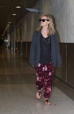 REESE WITHERSPOON Arrives at Miami International Airport 2012
