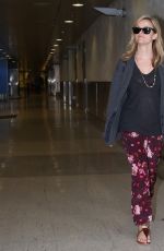 REESE WITHERSPOON Arrives at Miami International Airport 2012