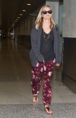 REESE WITHERSPOON Arrives at Miami International Airport 2012