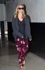 REESE WITHERSPOON Arrives at Miami International Airport 2012