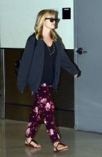 REESE WITHERSPOON Arrives at Miami International Airport 2012