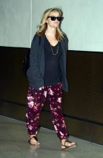 REESE WITHERSPOON Arrives at Miami International Airport 2012