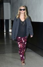 REESE WITHERSPOON Arrives at Miami International Airport 2012