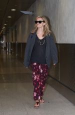 REESE WITHERSPOON Arrives at Miami International Airport 2012