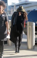 SELENA GOMEZ Arrives at JFK Airport in New York