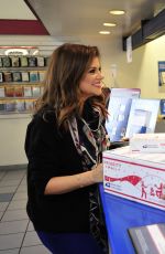 TIFFANI THIESSEN Arrives at a Post Office in Los Angeles