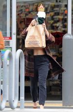 VANESSA HUDGENS Leaves Walgreens in Los Angeles