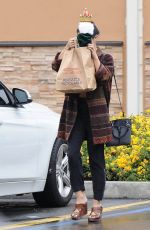 VANESSA HUDGENS Leaves Walgreens in Los Angeles