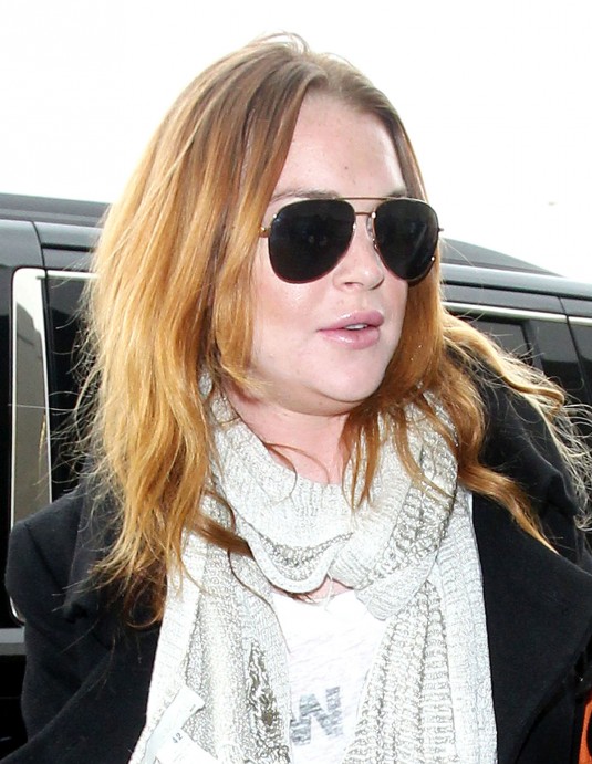 LINDSAY LOHAN at JFK Airport